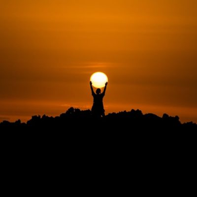 silhouette of person holding dun