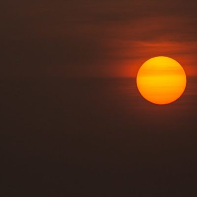 low-light photo of sun